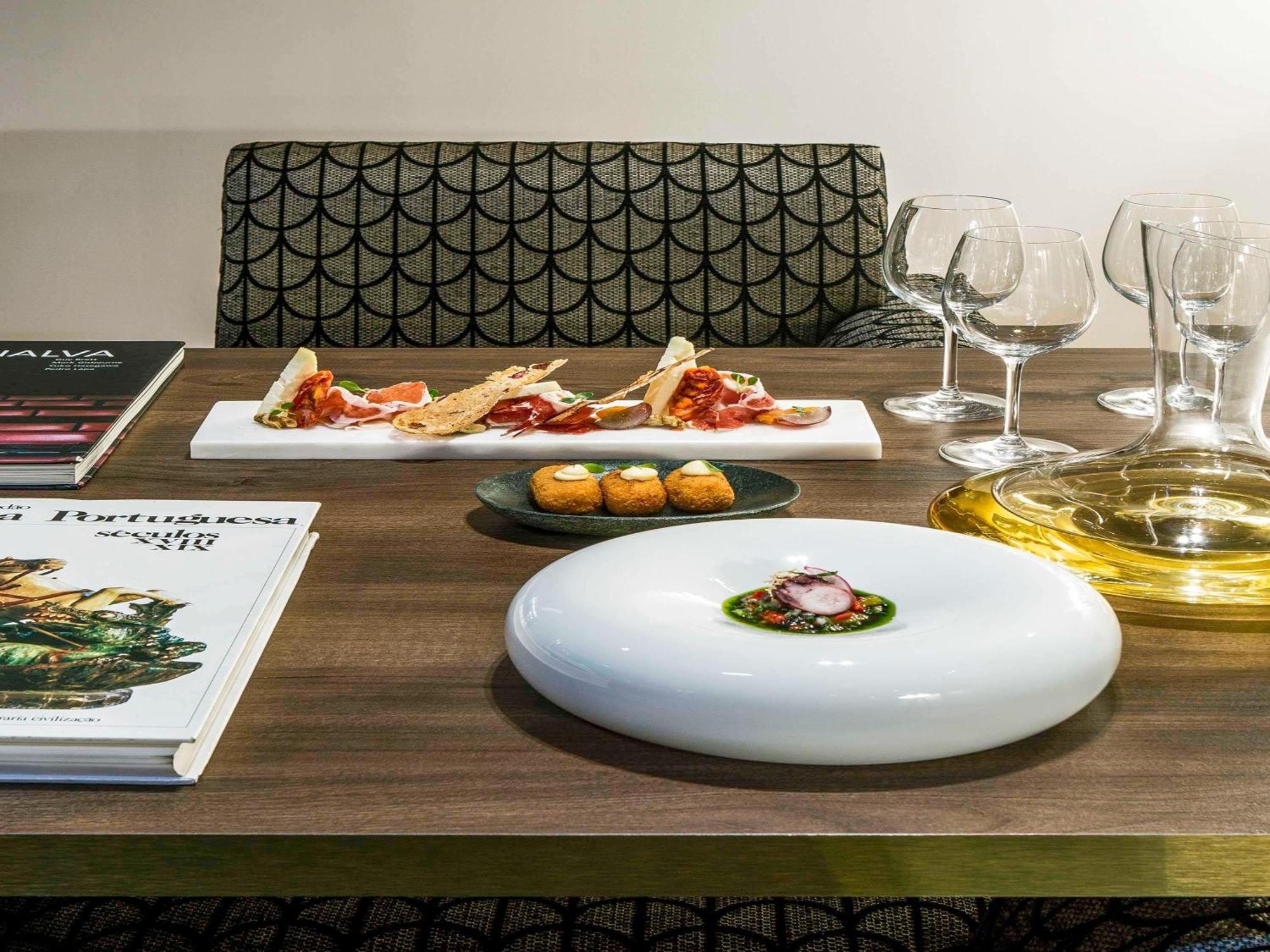 Sofitel Lisbon Liberdade Hotel Exterior photo A selection of tapas