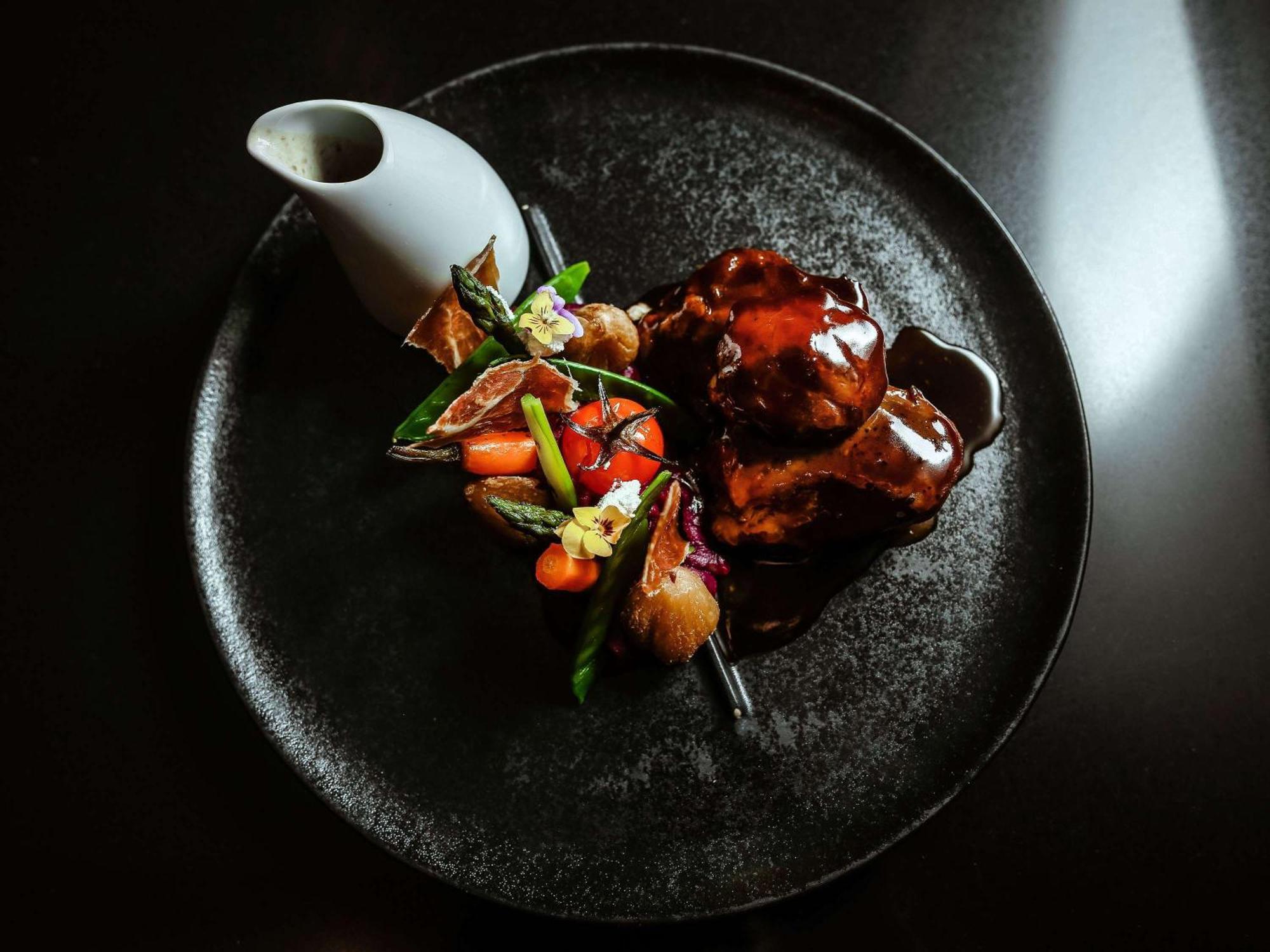 Sofitel Lisbon Liberdade Hotel Exterior photo A plate of teriyaki chicken