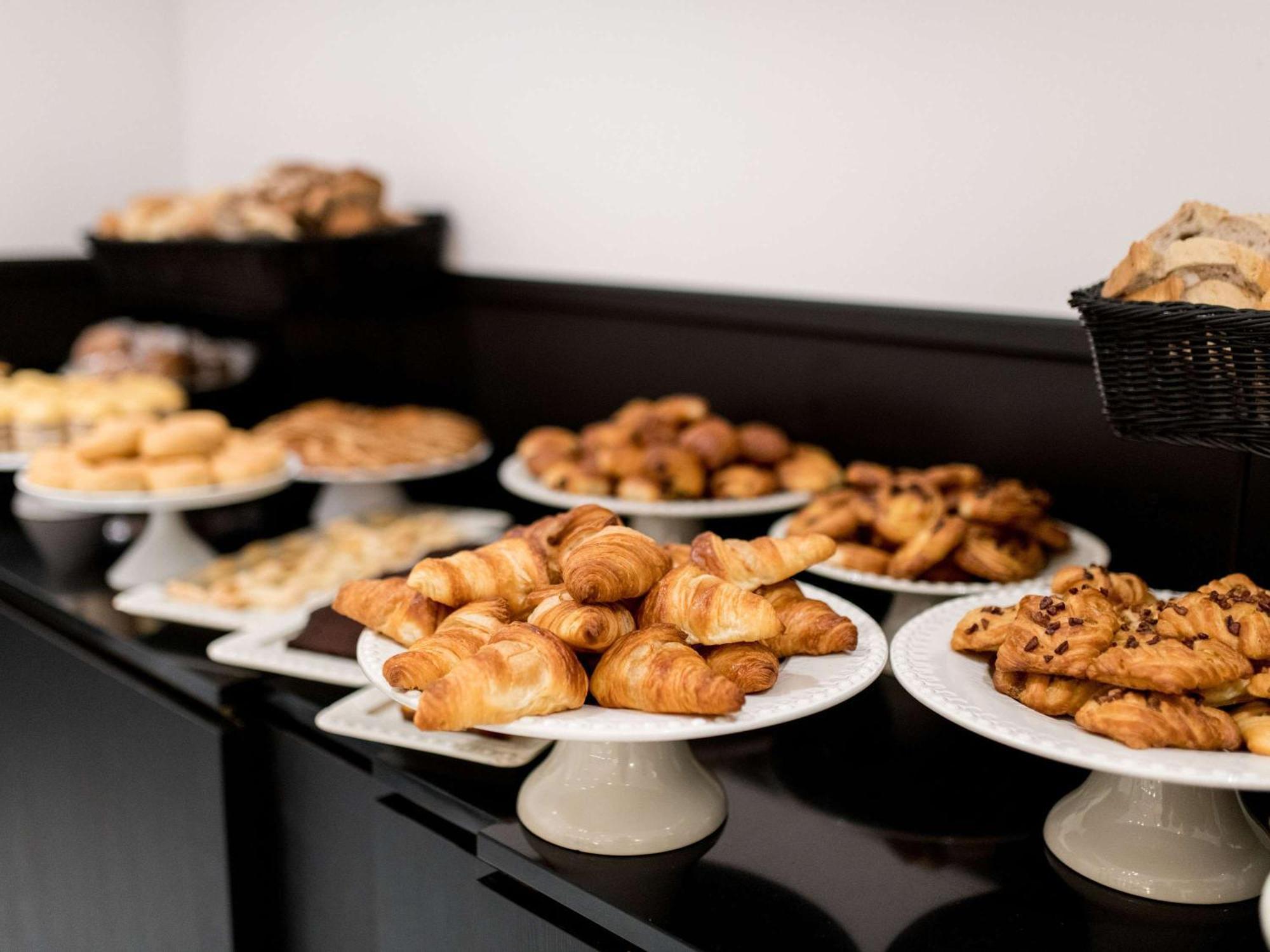 Sofitel Lisbon Liberdade Hotel Exterior photo A selection of pastries